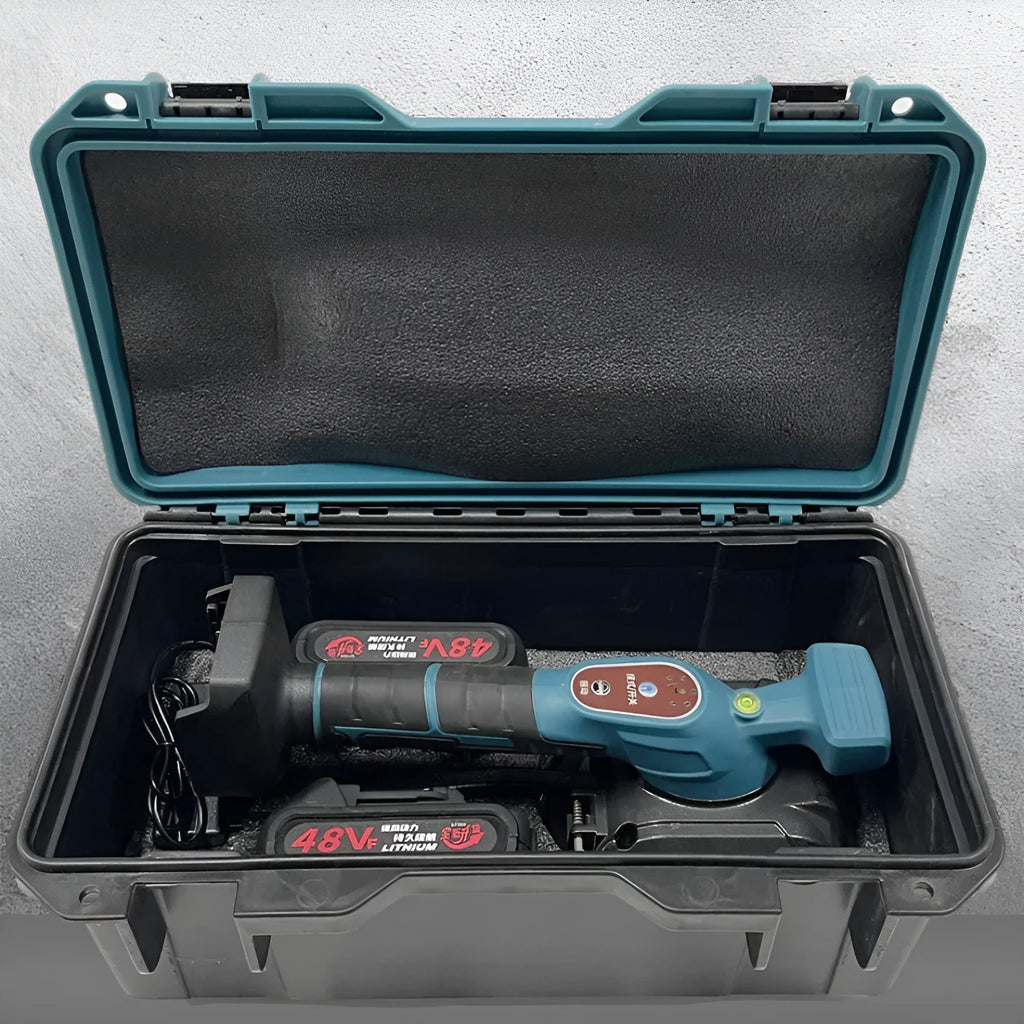 Household electric ceramic tile tiling machine with lithium battery and two batteries on work surface