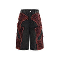 Distressed denim cropped pants with wide leg silhouette and brushed stitching details