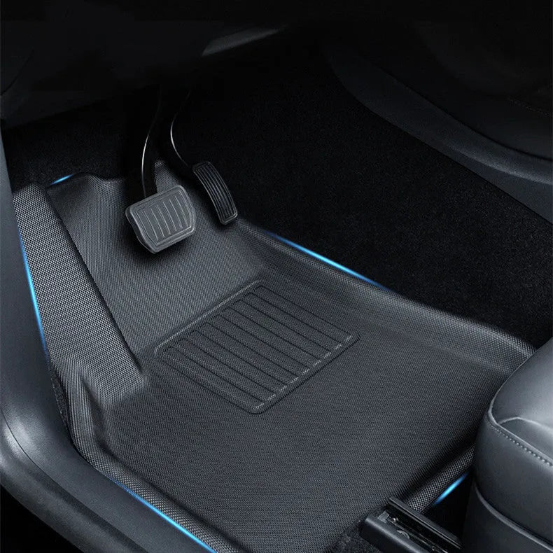 Custom TPR floor mat set for Tesla Model Y showing footwell, storage box, and tailbox mats.