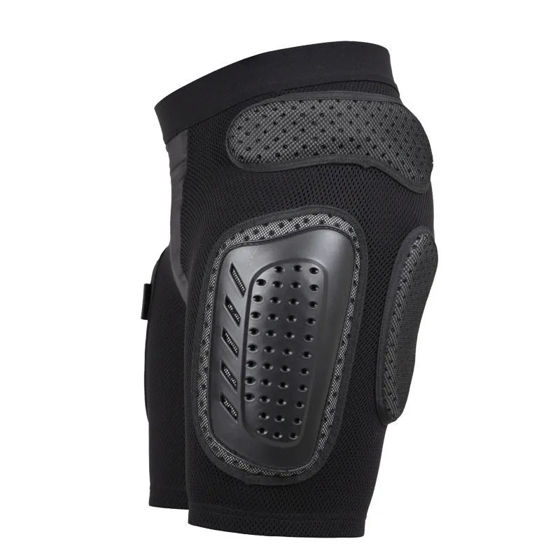 Black cycling hip protection pants showing protective panel positioning for hip impact reduction