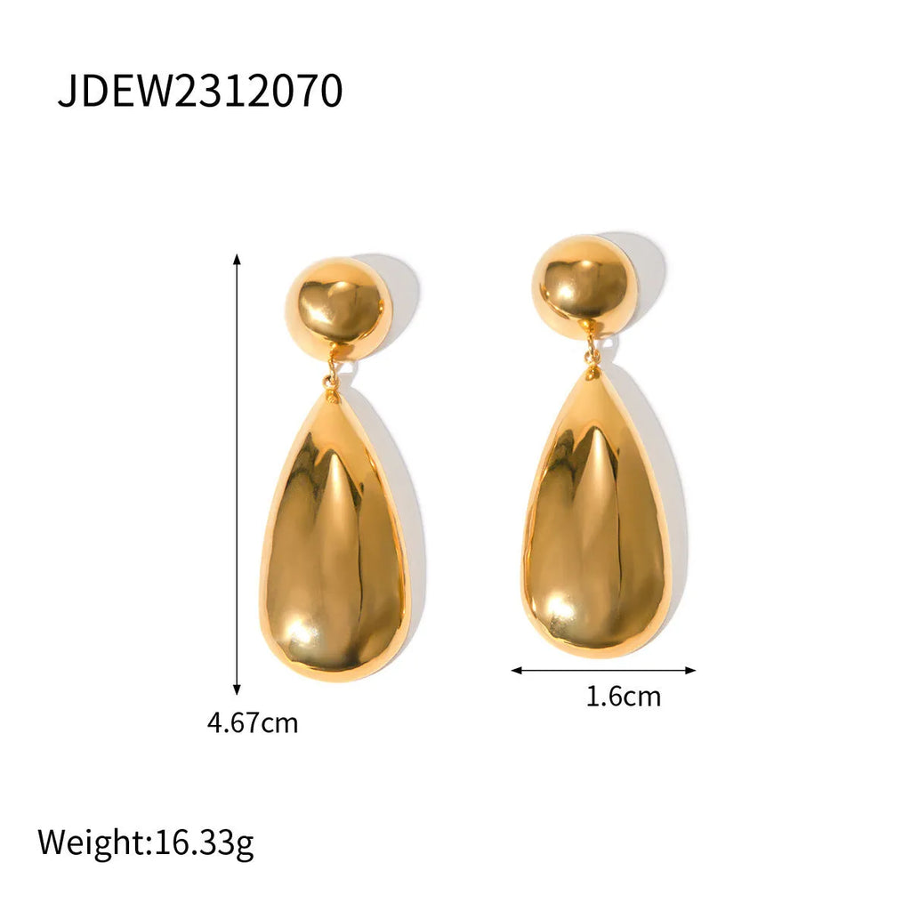 Gold coloured stainless steel earrings with a geometric hemisphere and water drop pendant design.