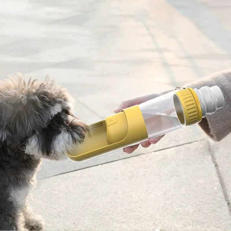 Dark blue portable dog water bottle with built-in drinking bowl showing leak-proof lock mechanism