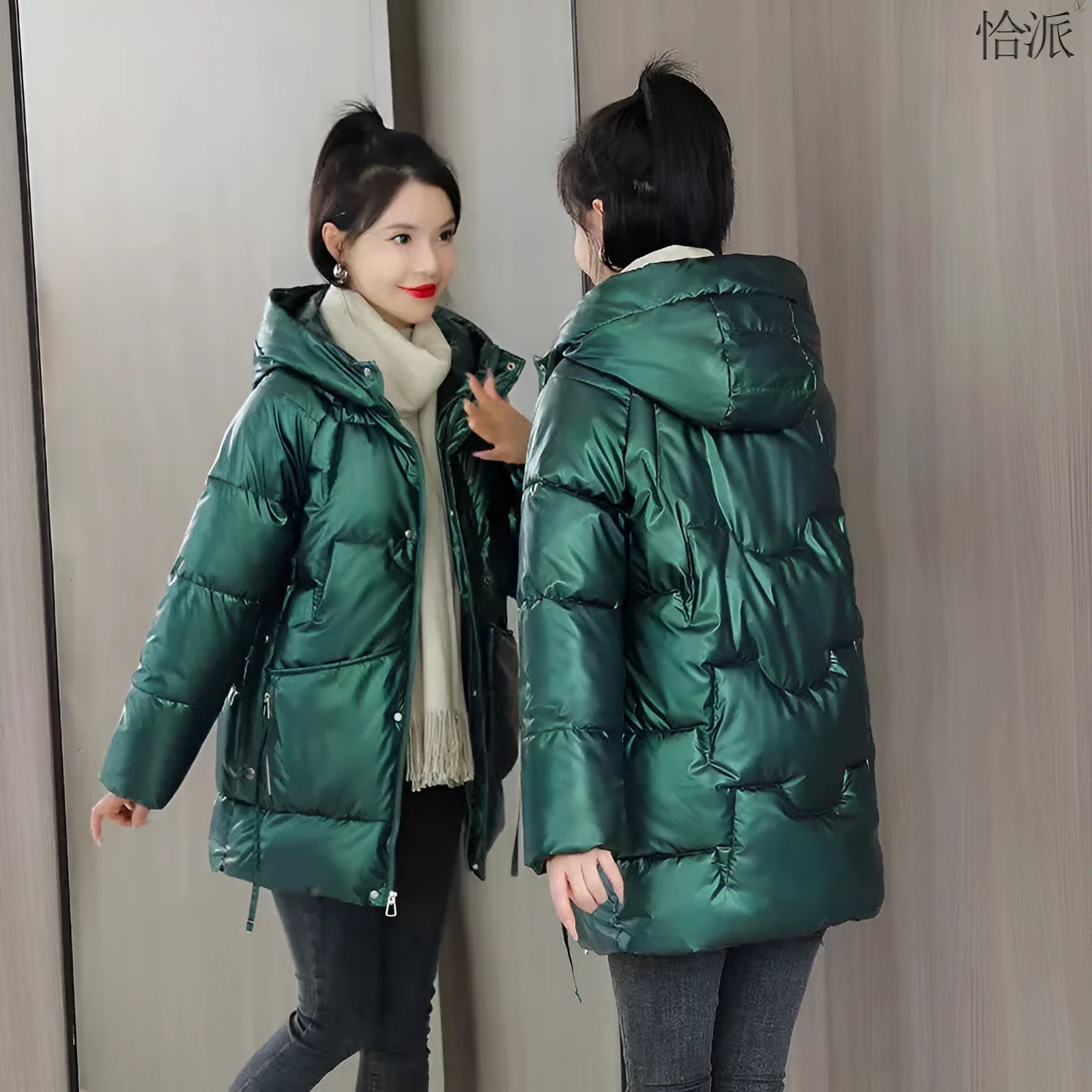 A woman's loose-fit hooded winter jacket in a thick fabric, shown in a choice of colours.