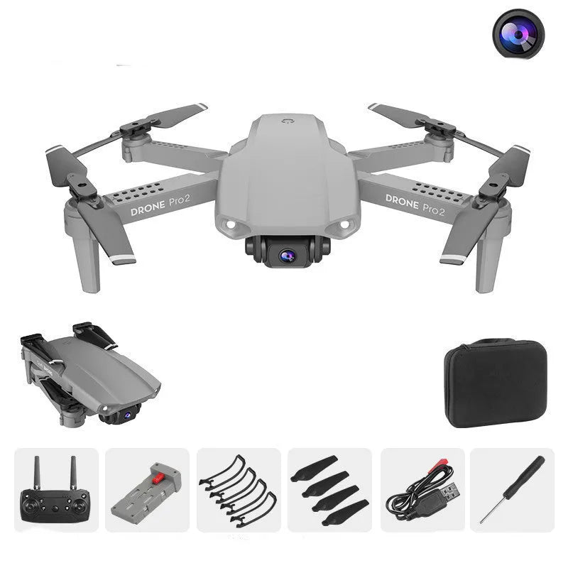 E99Pro2 folding dual camera drone black with propellers on table
