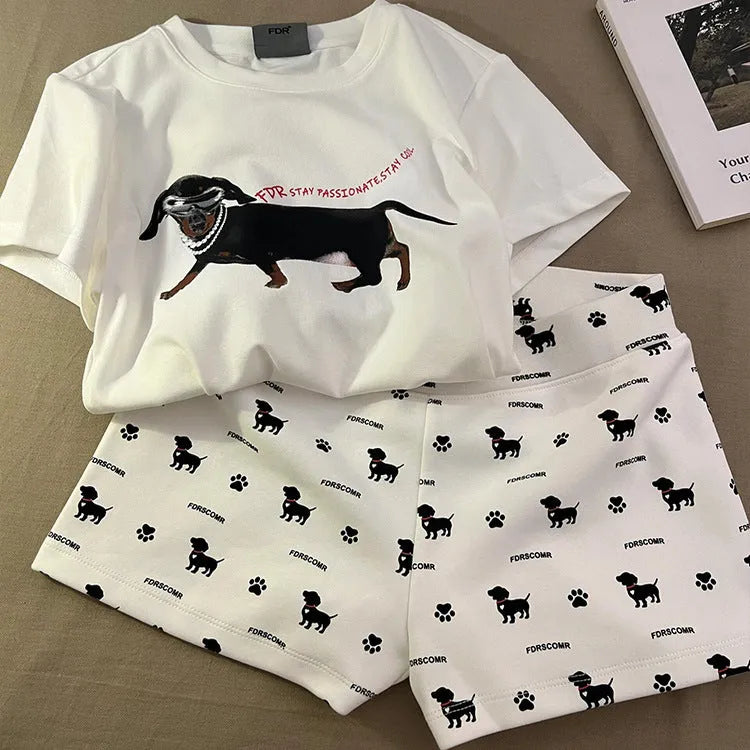 Sausage dog print short sleeve pajama set includes top and shorts in graphic-coloured suit