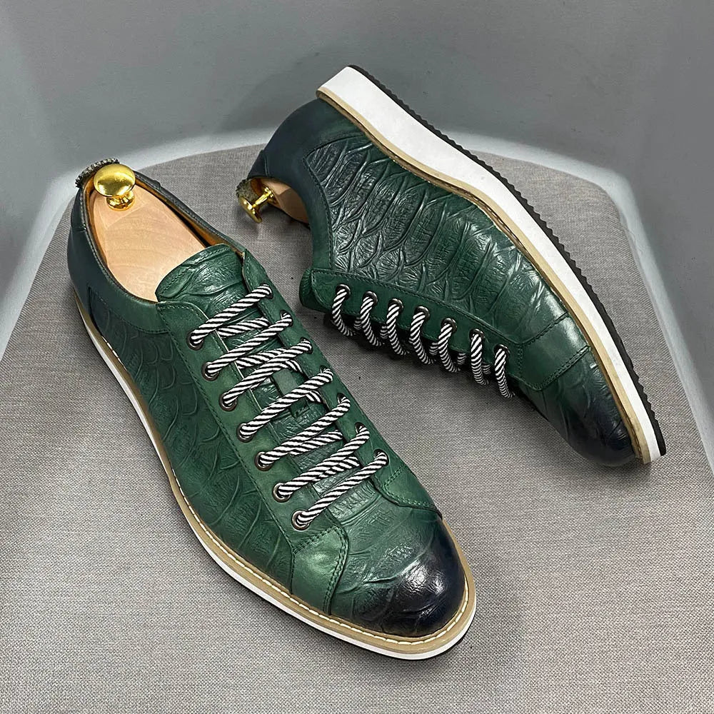 Men's white low-top lace-up shoes with an embossed patterned upper, shown on a plain background.
