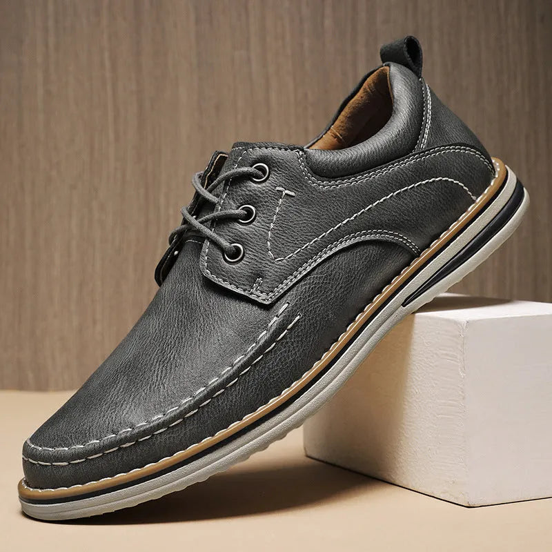 Men's genuine leather casual shoes with round toe and front lace-up in black, brown, or grey colour options