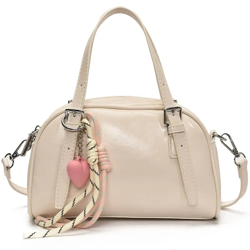 Korean-style square shell shoulder bag in soft PU leather with optional pendant decoration