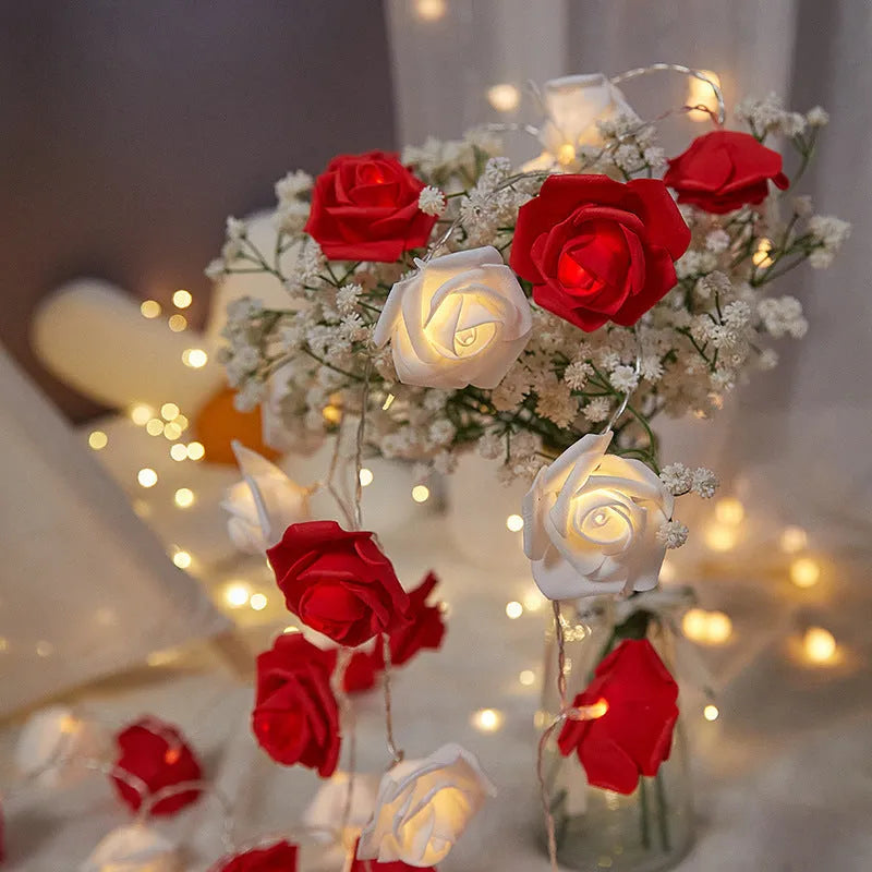 LED rose fairy lights with battery pack showing pink foam rose-shaped covers on 1.5 metre cable