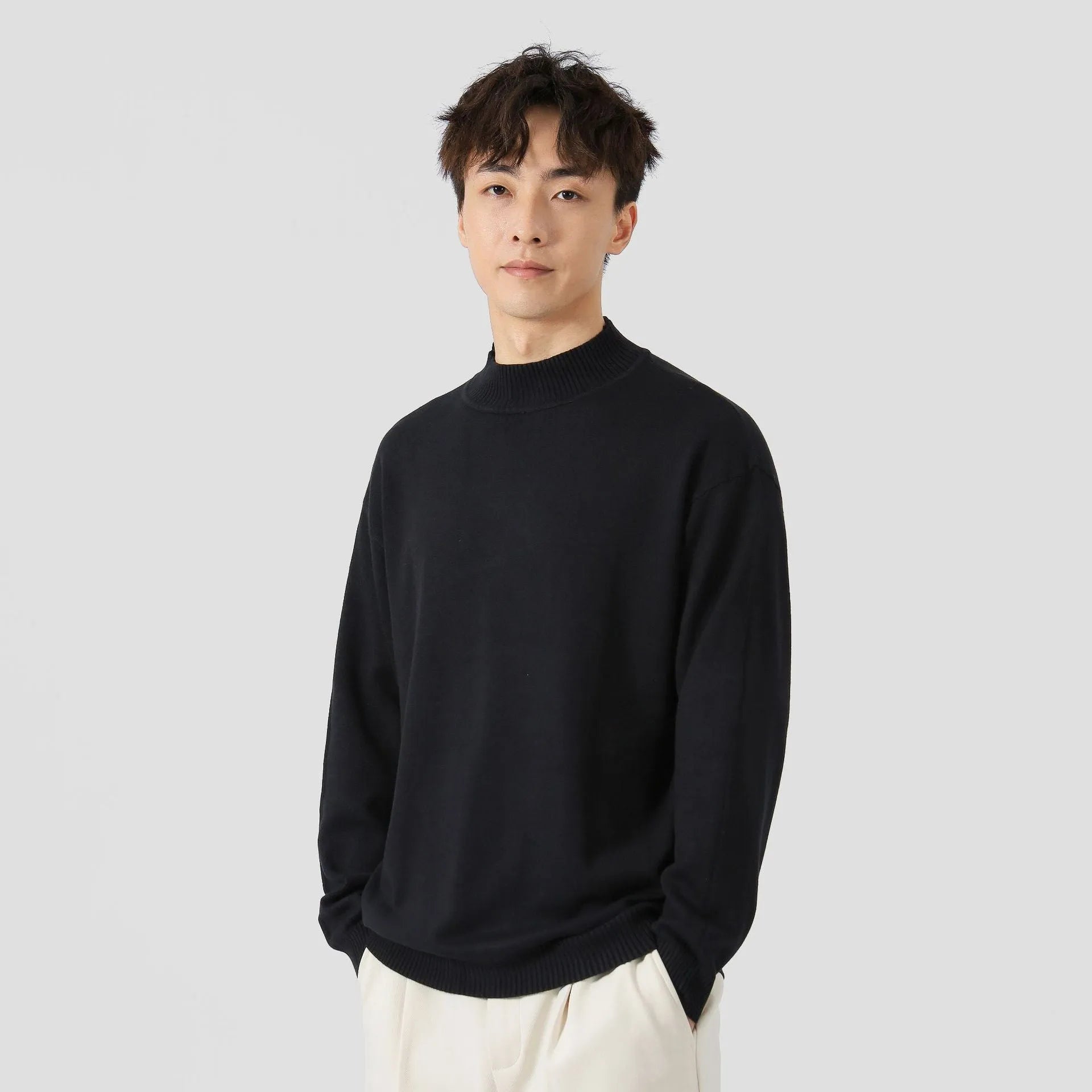 Men's loose-fit long-sleeved pullover sweater in a casual style, shown in a choice of colours.