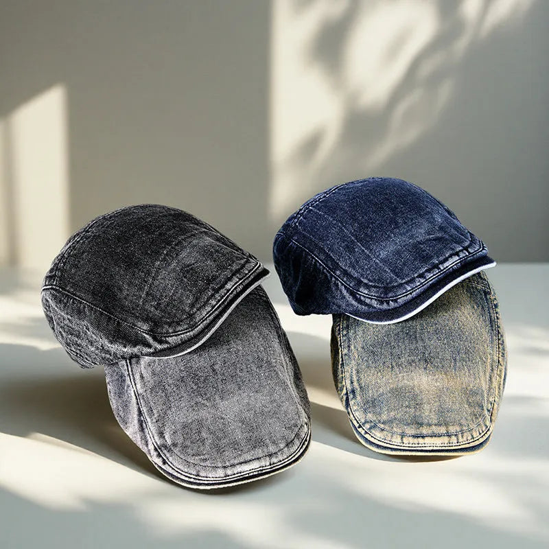 Men's flat top denim cap in wash-treated cotton fabric on a neutral background.