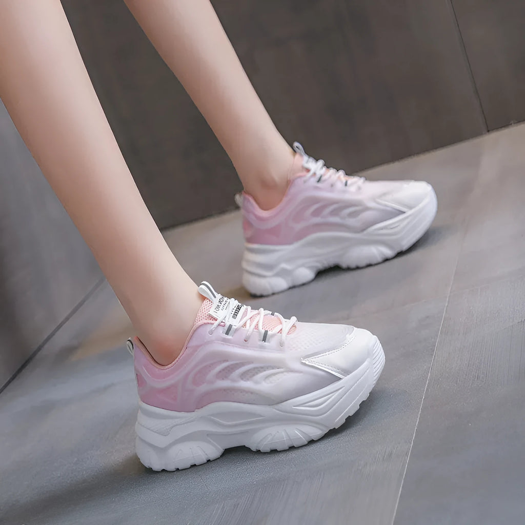 Women's casual shoes with satin upper in blue colour showing round toe and lace-up design