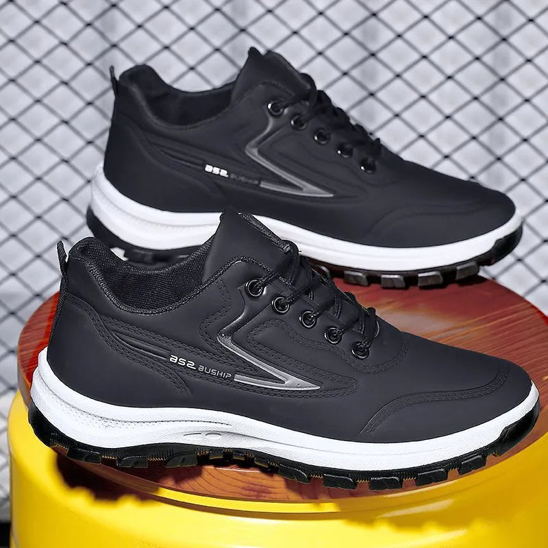 Black and red waterproof leisure shoes with soft plastic sole and lace-up front