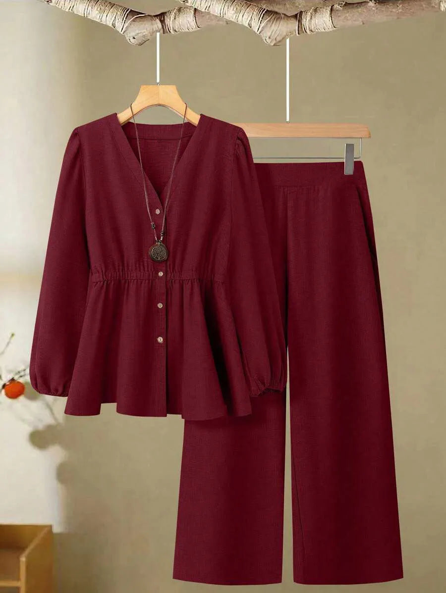 Women's polyester two-piece suit in khaki with long sleeves, button detailing, and matching trousers