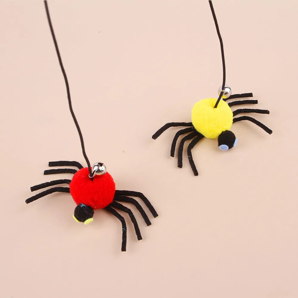 Hanging door cat toy with elastic rope, feather and bell spider accessory in red colour