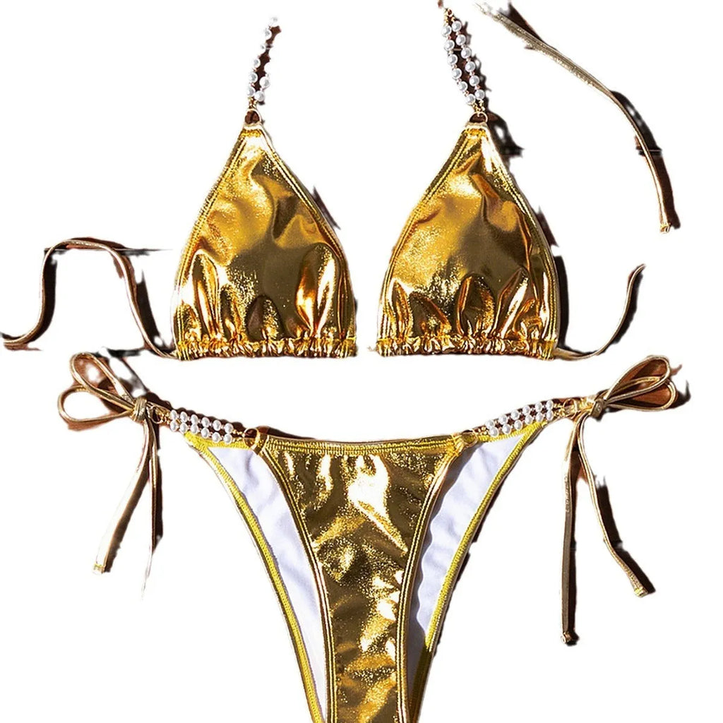 Gold halter lace-up bikini with pearl chain detail and briefs-style bottoms
