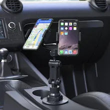 Peak-X5 silicone automobile phone holder with flexible construction for car and desktop mounting