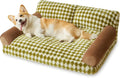 A checkered pattern pet sofa bed for a small dog or cat on a wooden floor.