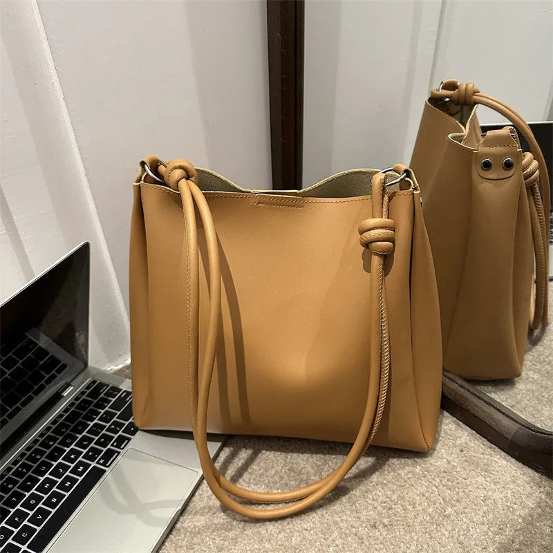 Women's crossbody tote bag in retro bucket shape, PU material, available in yellow brown, brown, black, khaki, with sewing line detail