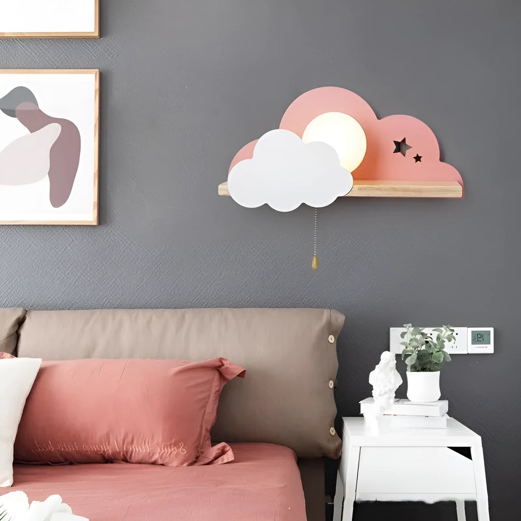Simple cloud-shaped glass wall lamp mounted on a wall in a grey finish.