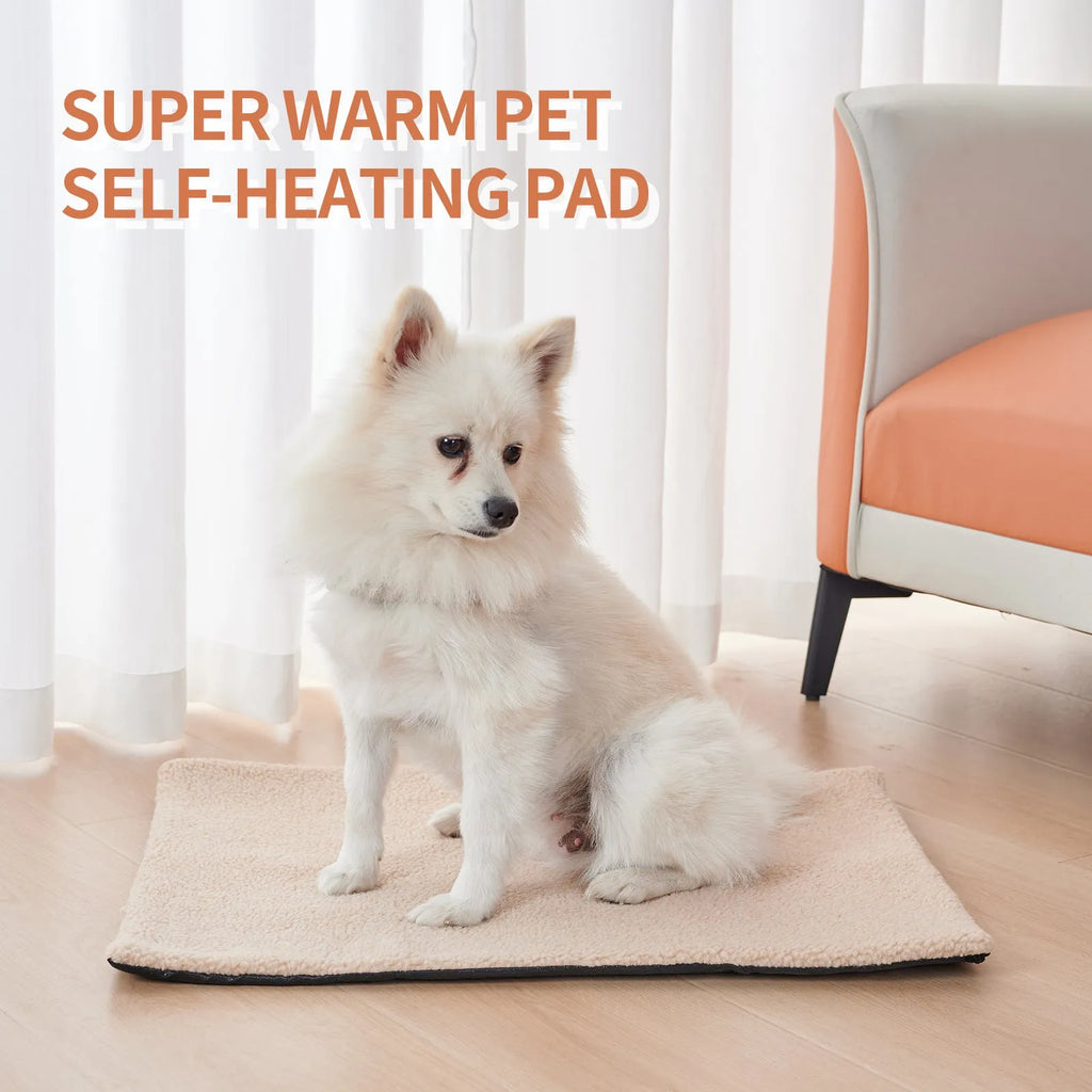 Grey self-heating plush pet pad for cats on a wooden floor