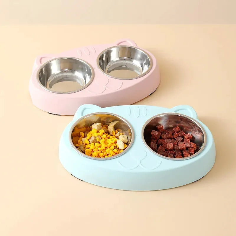 Blue plastic double-bowl pet feeder with non-slip rubber feet for cat or small dog food and water