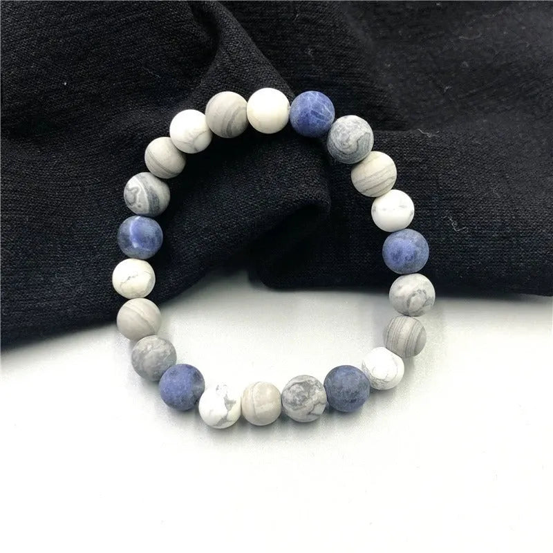Universe Wind planet stone bracelet showing 10mm natural stone bead on adjustable hand-tied cord