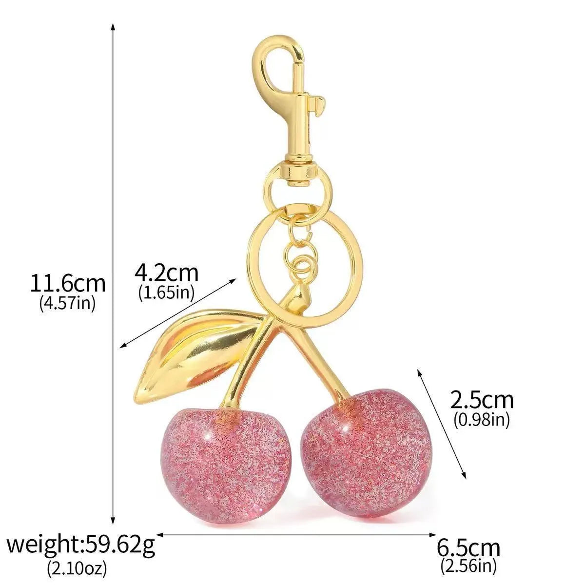 Red cherry-shaped zinc alloy keychain pendant with three-dimensional design on white background
