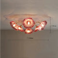 Modern flower-shaped ceiling lamp with multiple light heads in white or purple colour