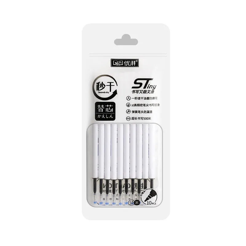 Four bullet-shaped ballpoint pen refills with quick-dry ink in black, blue, red, and ink blue colours.