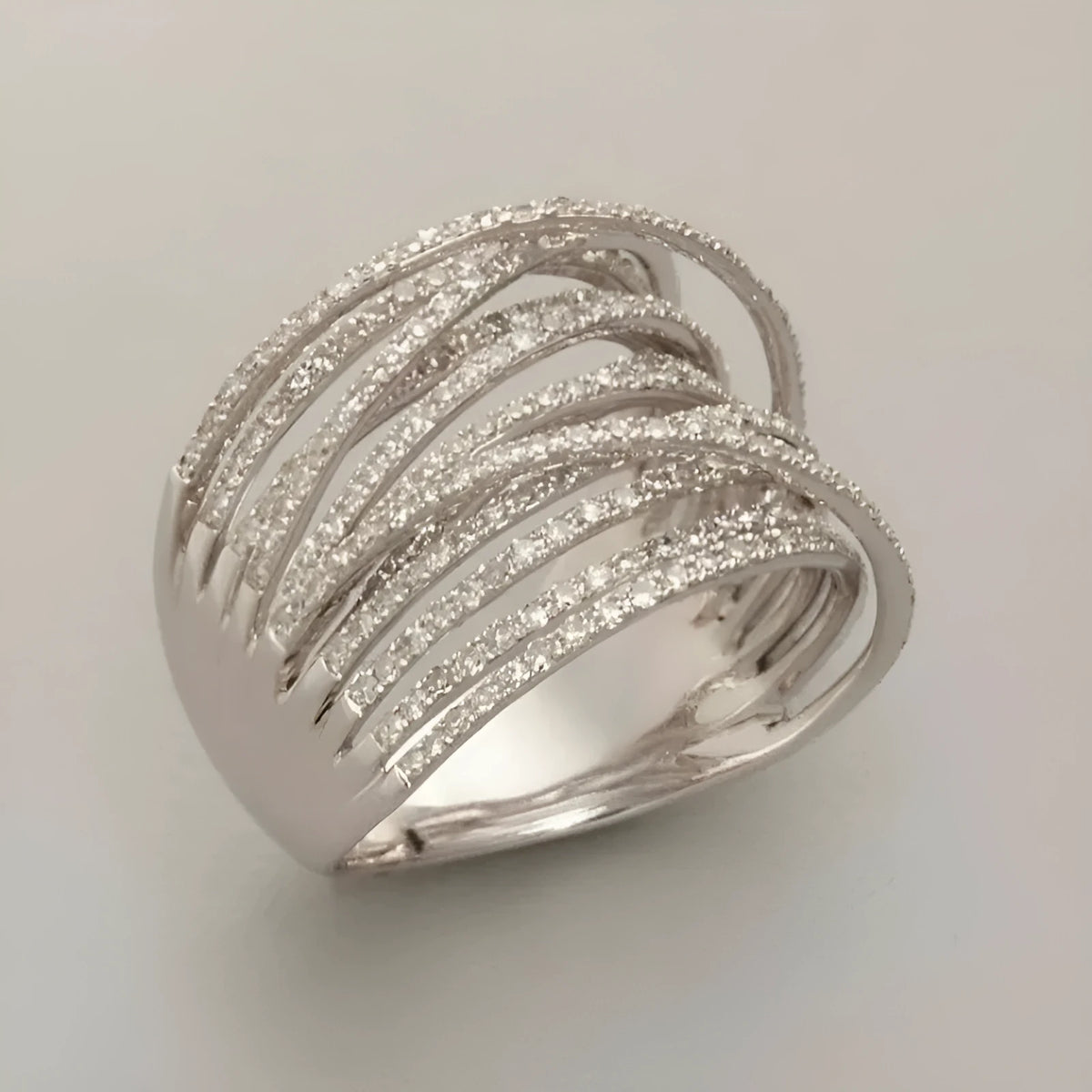 Silver multilayer geometric copper ring with micro inlay finish on white background