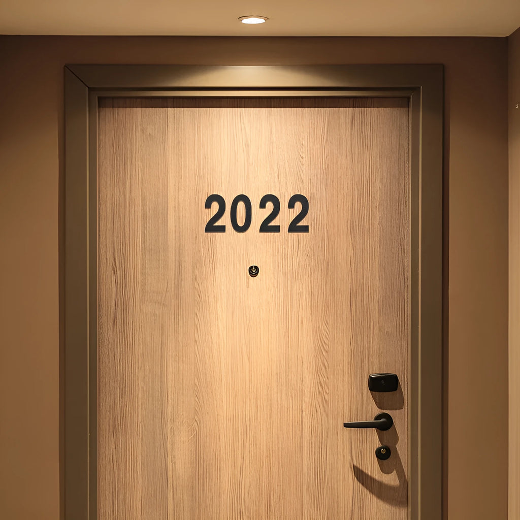 Black stainless steel adhesive house numbers showing 7.5cm characters