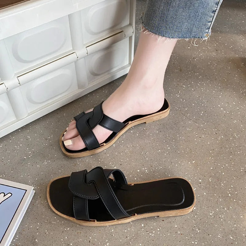 Women's PVC cross strap non-slip sandals in beige white colour on a plain background