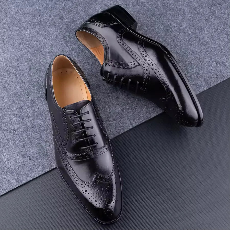 Purple men's Oxford shoes with hand-carved detailing and a pointed toe.