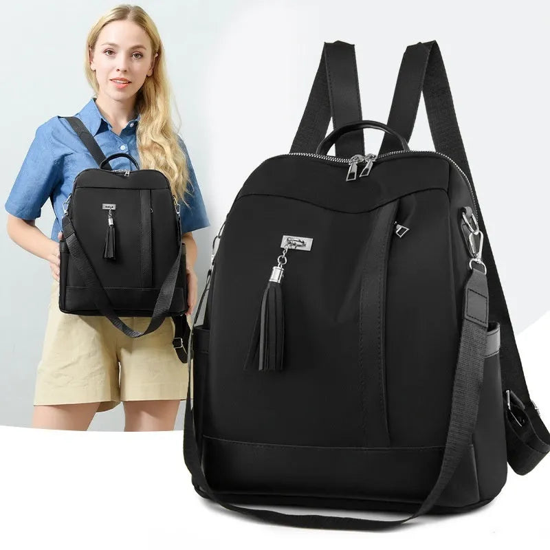 Women's Oxford cloth backpack with large capacity, anti-theft design, and multiple pockets in Black