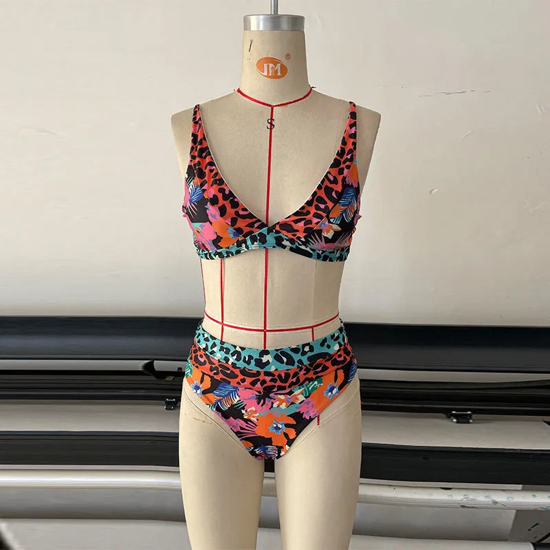 Women's floral print high-waist bikini swimsuit set on a mannequin.