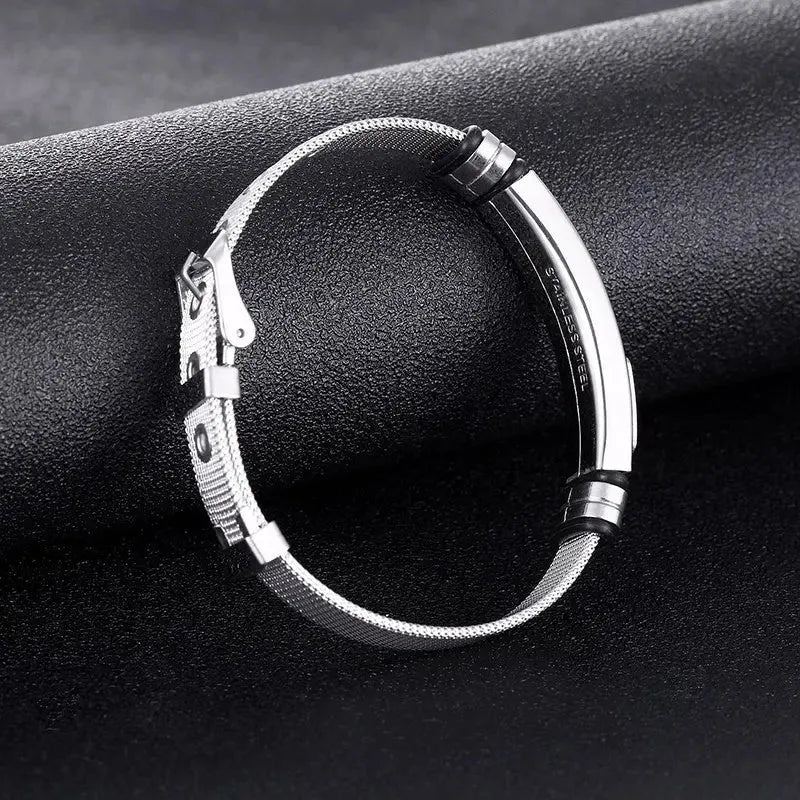 Adjustable 3D cross stainless steel mesh chain bracelet in gold on a white background