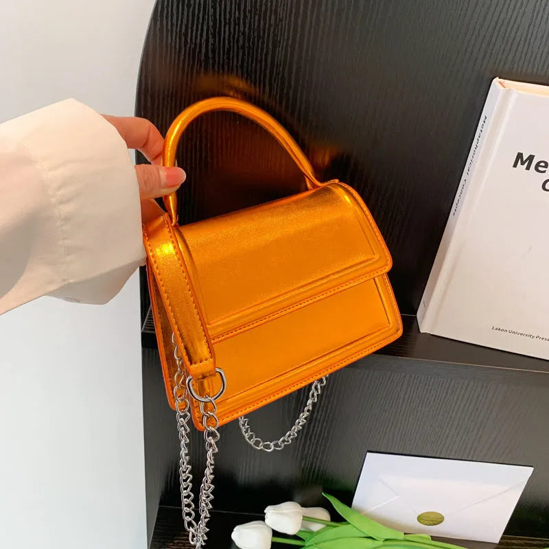 Retro PU leather shoulder bag in horizontal square shape with crossbody strap