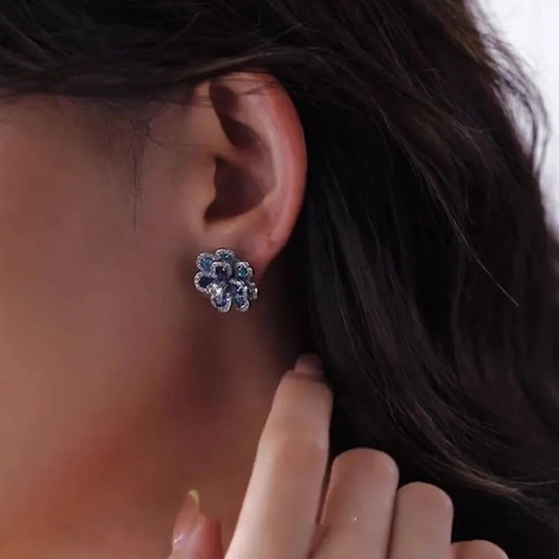 Blue flower stud earrings for women with shiny diamond detailing and zinc alloy electroplated construction