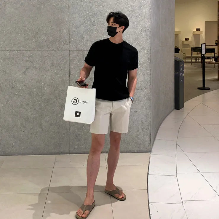 Men's straight-leg casual shorts in khaki, shown laid flat.
