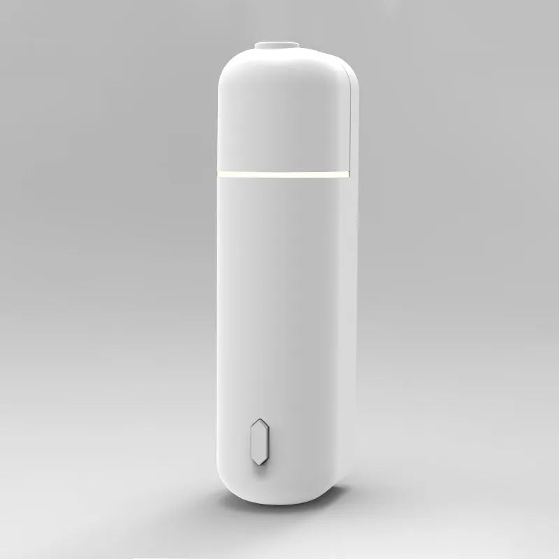 Automatic ultrasonic aroma diffuser in black, wall-mounted with single mist outlet, battery powered, 0.5L capacity