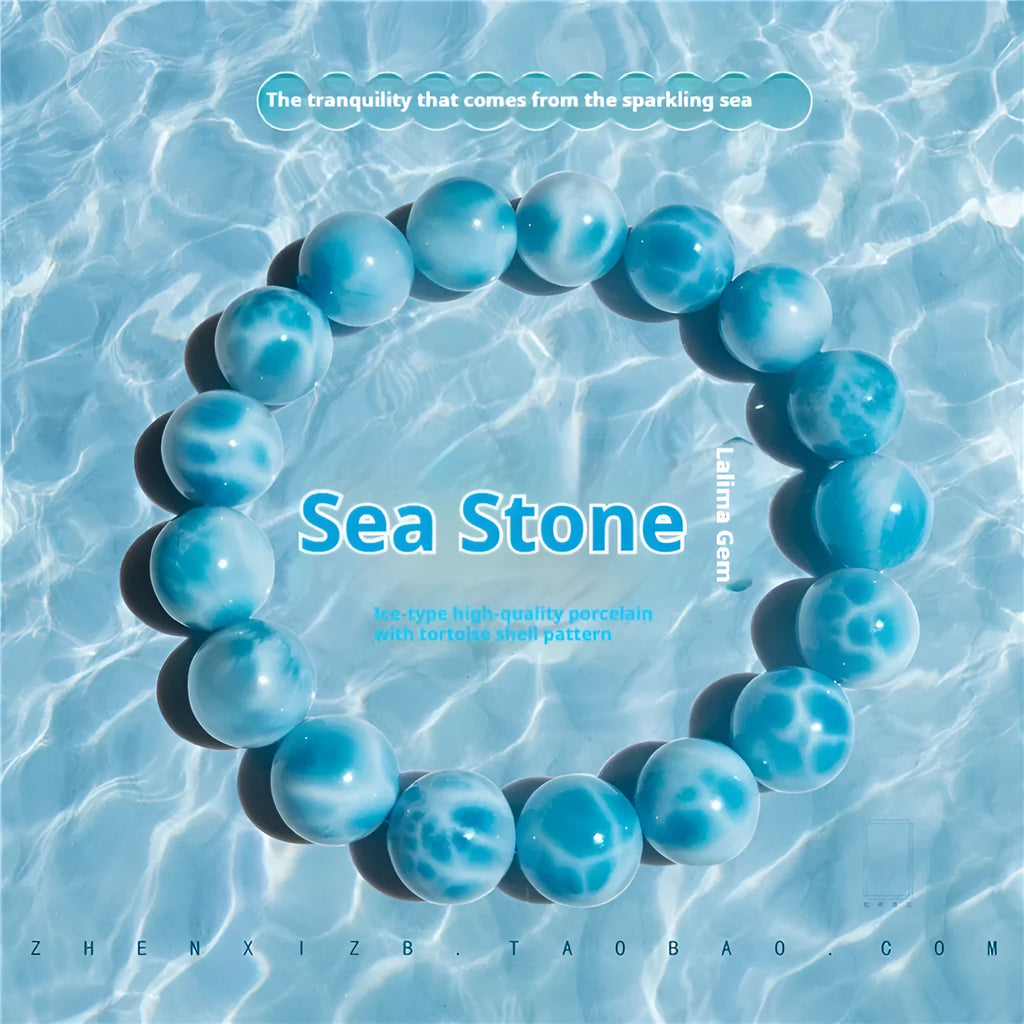 Blue handmade Bodhi bracelet with natural crystal stones and pearl accents in Maillard style.