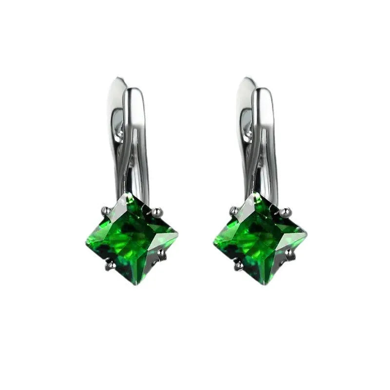 Pair of women's copper earrings with a diamond design and inlaid zircon detailing.