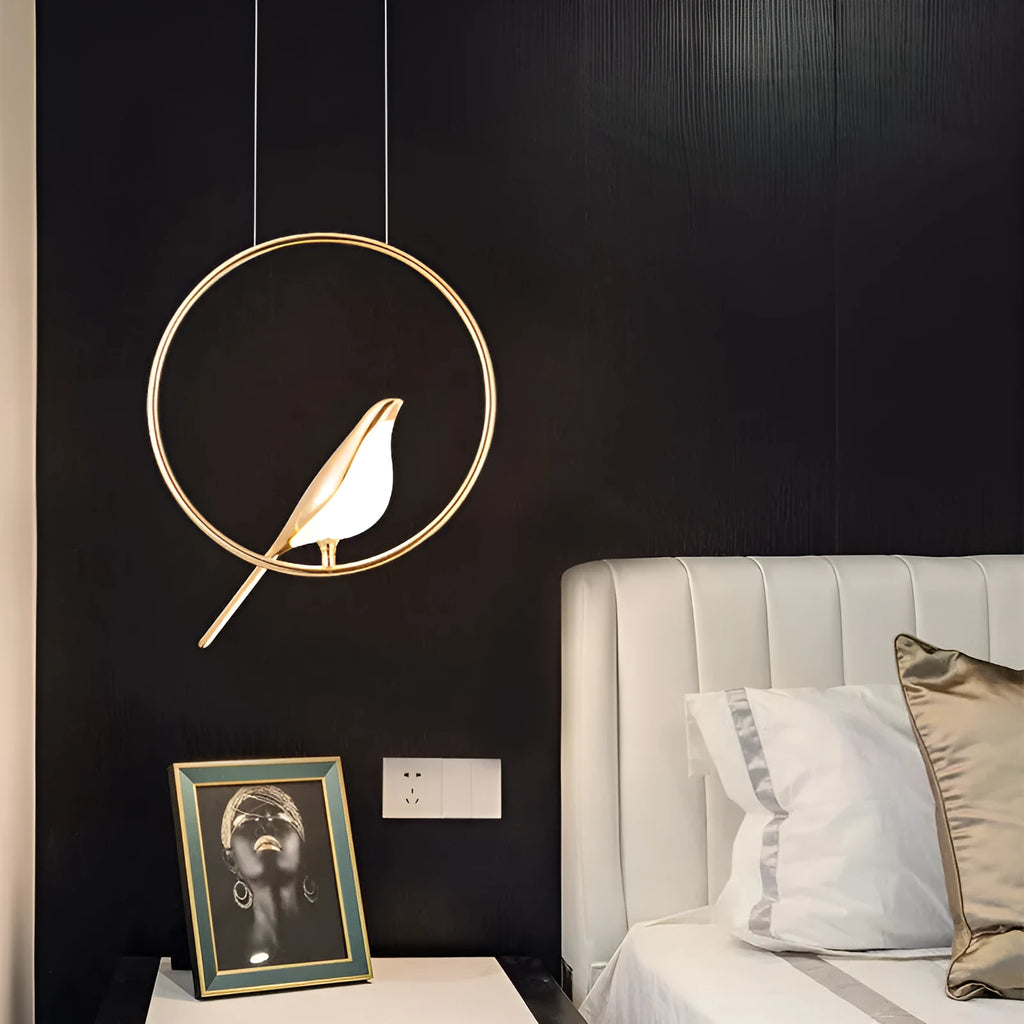 Modern minimalist magpie bird silhouette chandelier light fitting with a long drop.