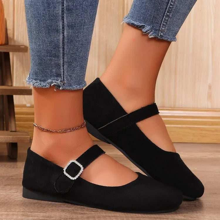 Black canvas fisherman shoes with low-top design and rubber soles