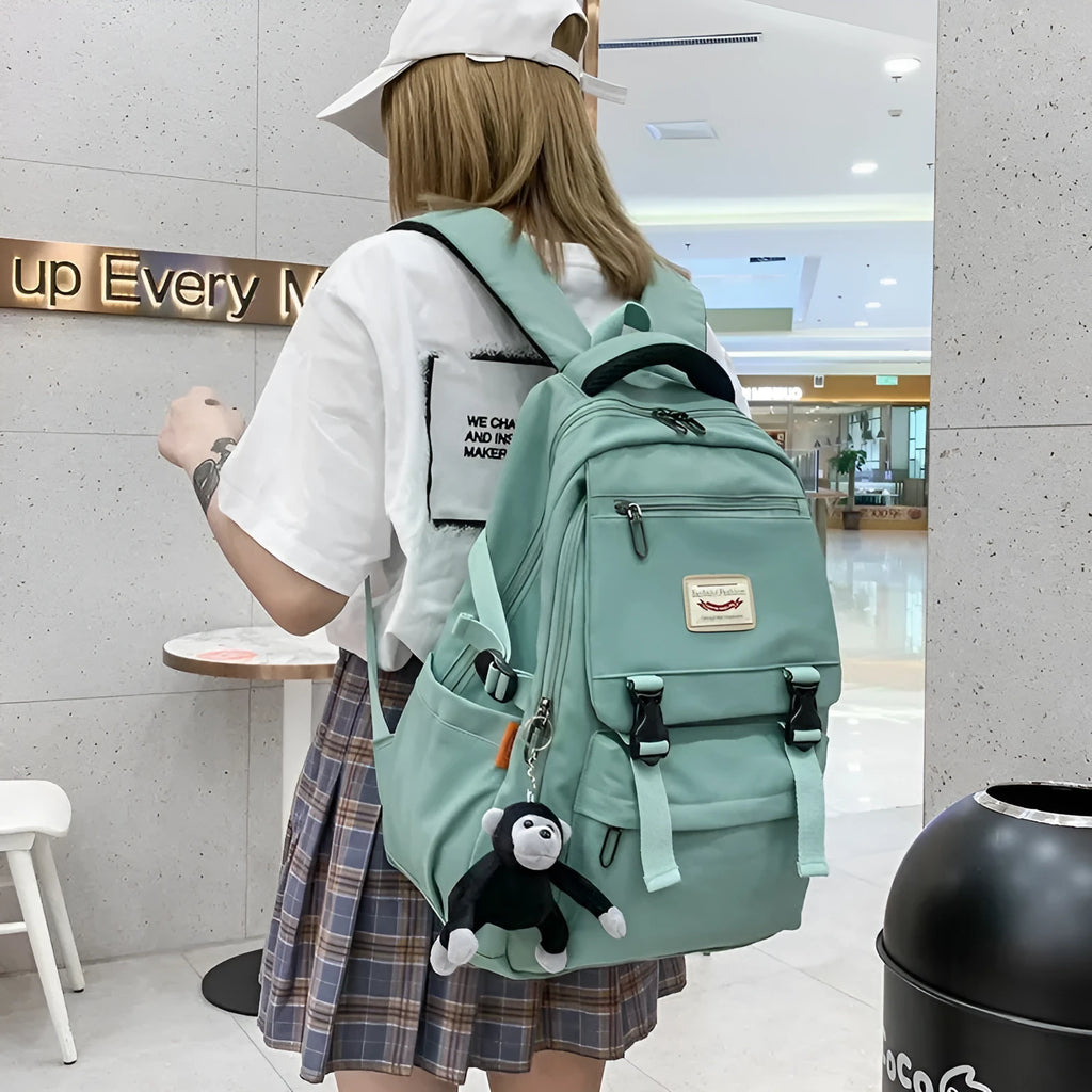 PVC student backpack with three-dimensional pocket, lace detail, available in six colours