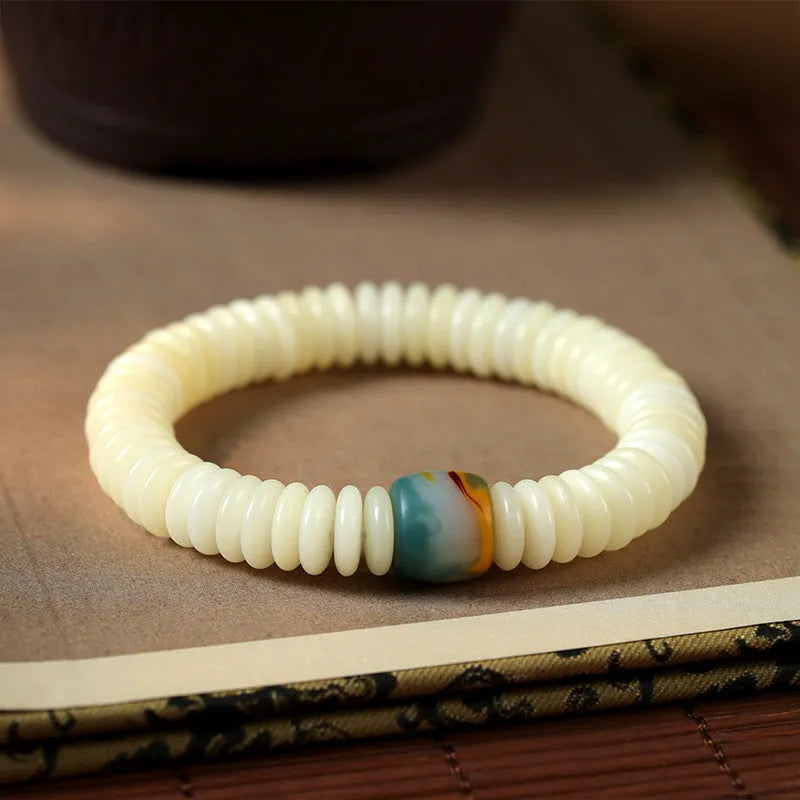 White Bodhi bead bracelet with 3 × 10mm beads in Tibetan style