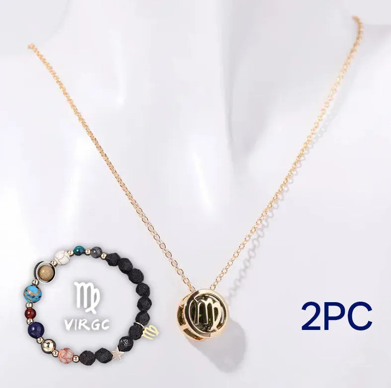 A natural stone beaded necklace and matching bracelet set laid flat, showing the textured stone beads.