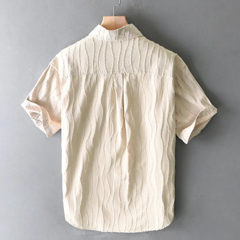 Men's apricot pure cotton loose short sleeve casual shirt on a hanger