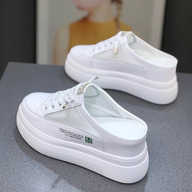 White women's platform shoes with mesh surface and heel-free design on rubber sole
